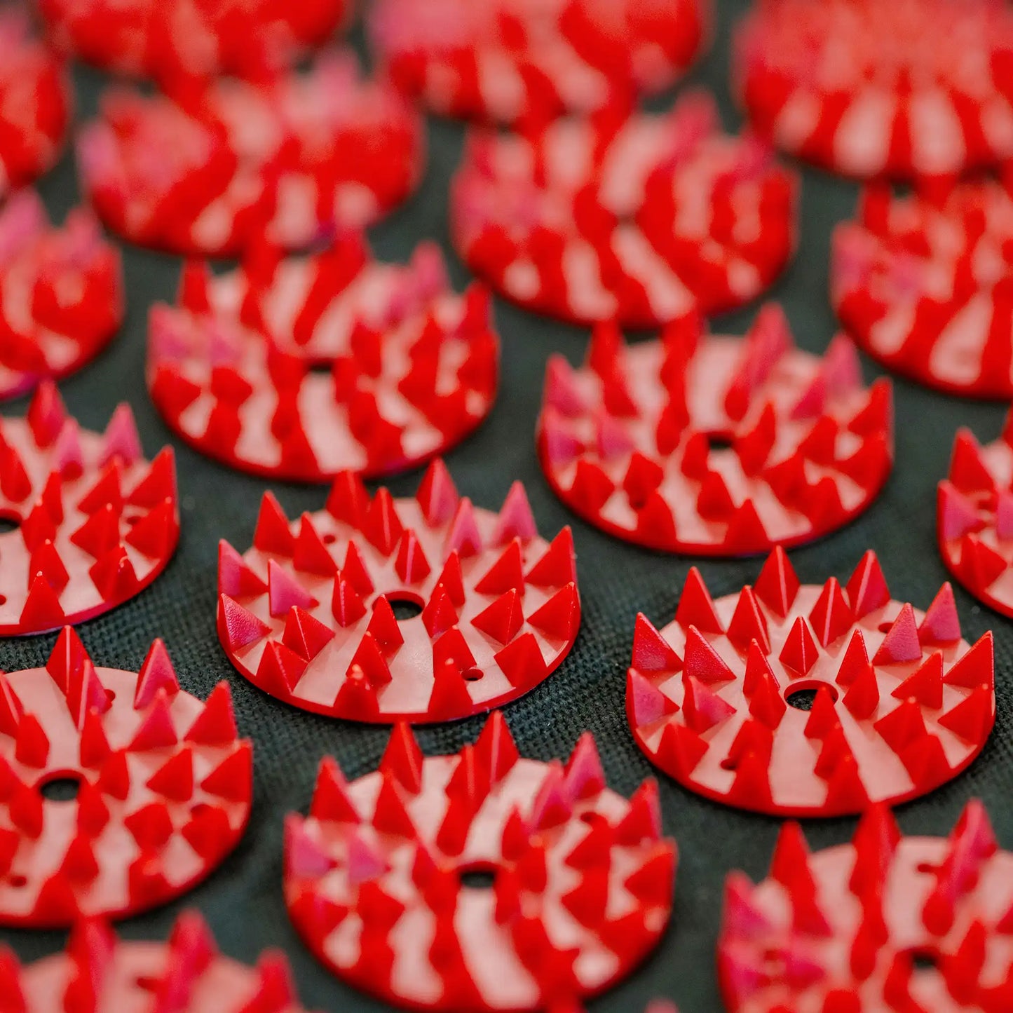Close-up view of therapeutic acupressure spikes on mat