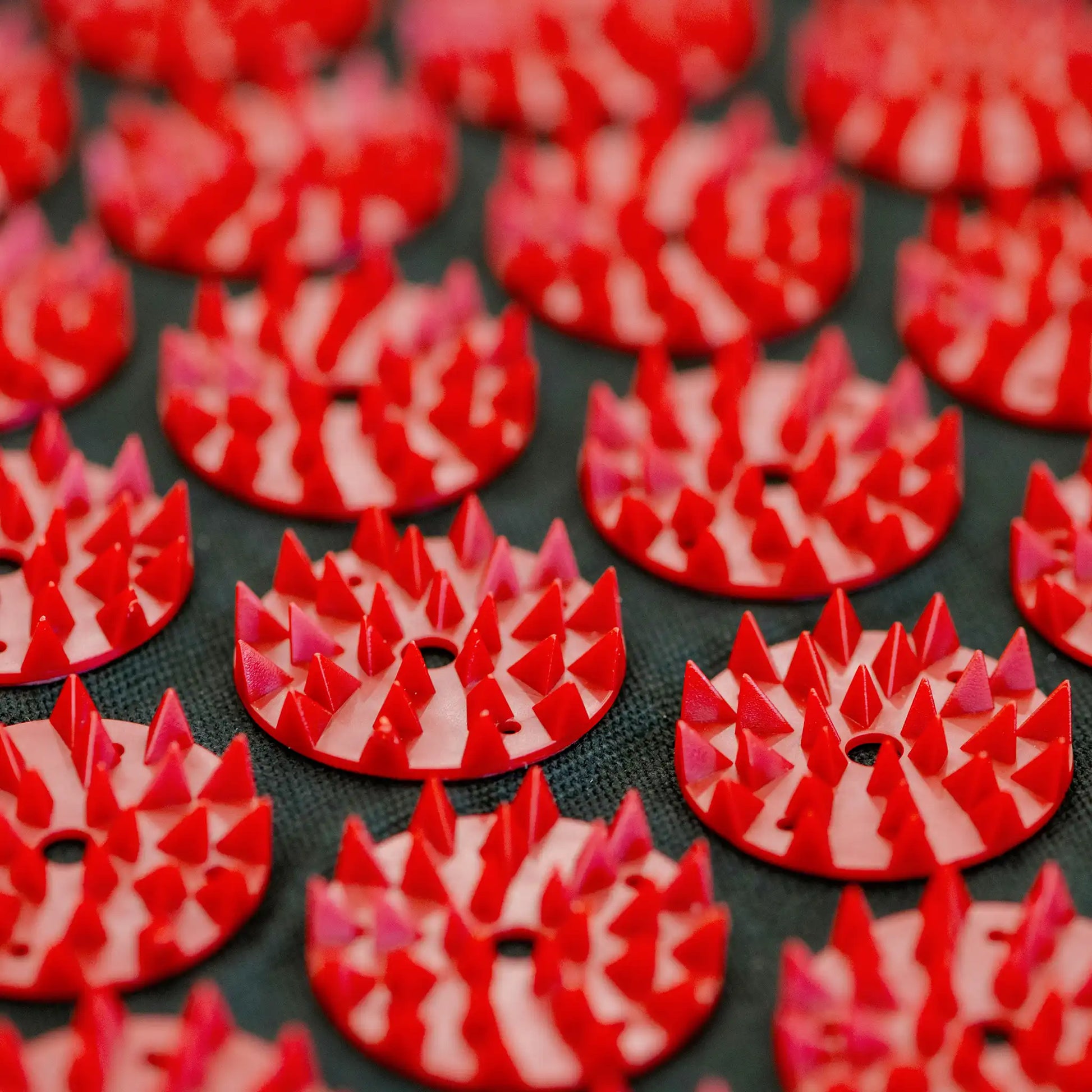 Close-up view of therapeutic acupressure spikes on mat